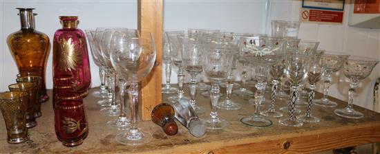 Collection of enamel decorated glasses, cranberry decanter set & another, etc